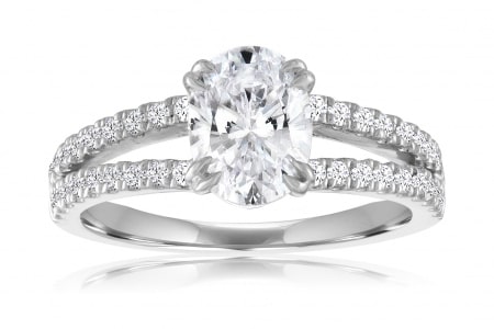 a split shank oval-cut diamond engagement ring from our in-house collection.