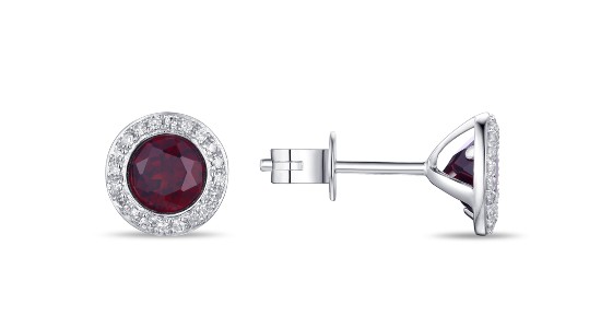 deep red garnet stud earrings in a white gold setting featuring diamond accents.