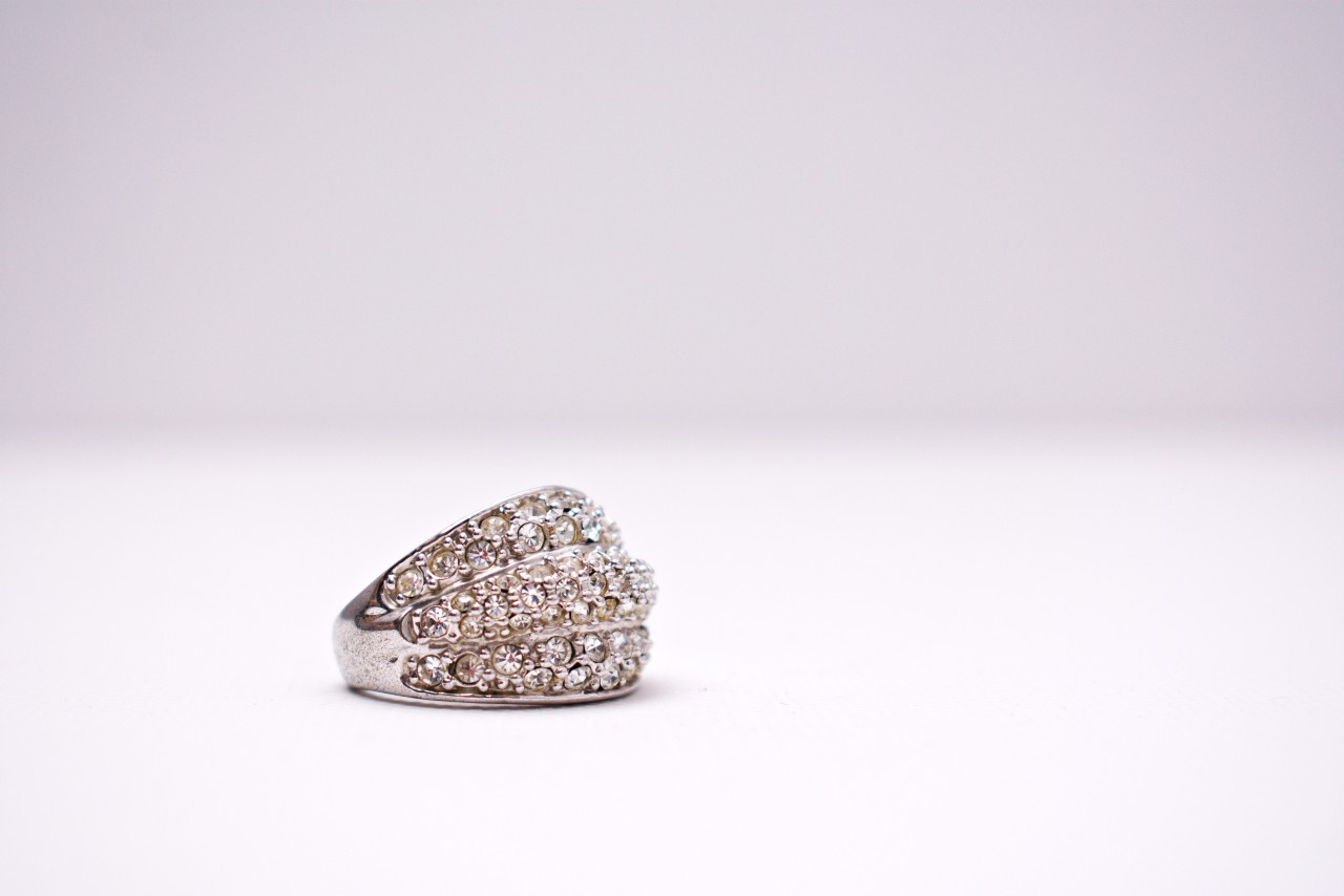 A ring featuring a brilliant pavé setting in three rows along the top.