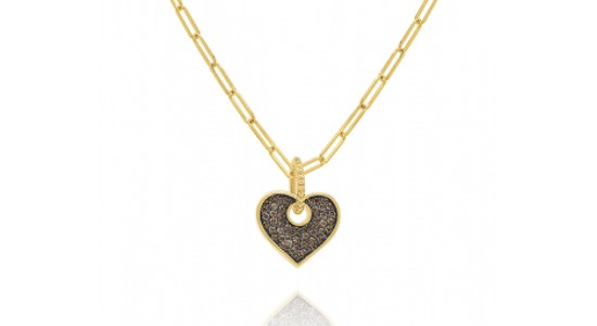 A yellow gold chain necklace with a heart-shaped pendant, available at Brockhaus Jewelry.