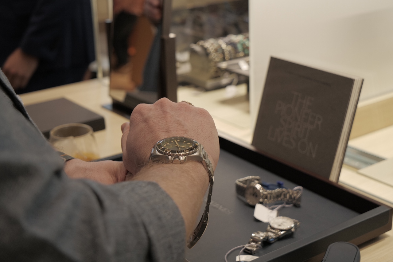 Man trying on a Longines watch