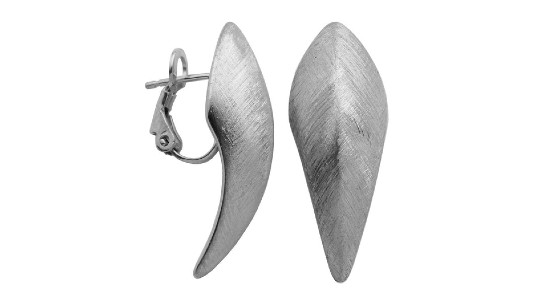 a pair of white gold stud earrings with a bold, organic silhouette