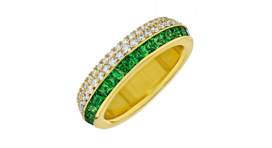 a yellow gold fashion ring featuring diamonds and green gems
