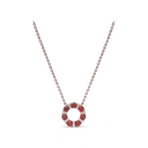 A ruby pendant from Fana on a rose gold chain.