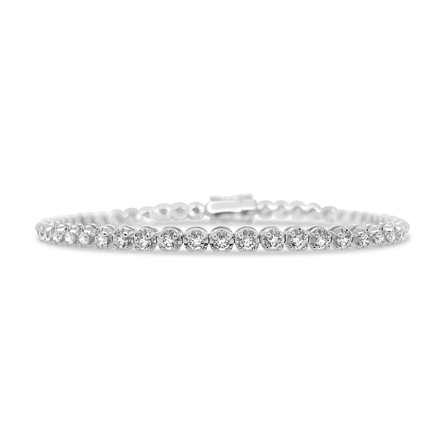 A white gold diamond tennis bracelet on a white background