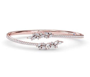 A 14k rose gold diamond bangle bracelet from Fana.