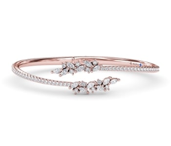 A 14k rose gold diamond bangle bracelet from Fana.